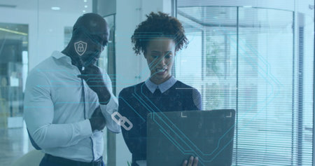 Image of data processing over diverse business people at office. Global business, computing and digital interface concept digitally generated image.の写真素材