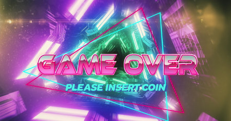 Image of game over text banner over neon green and pink glowing tunnel in seamless pattern. image game interface and technology conceptの写真素材