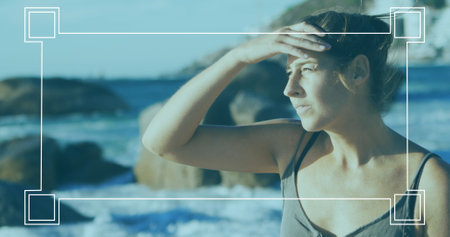 Image of frame over caucasian woman at beach. Sport, shopping and retail concept digitally generated...
