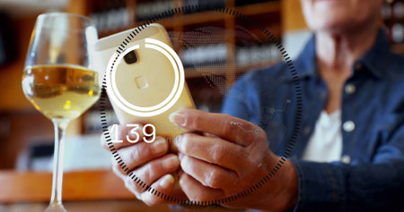 Image of data processing and globe over hands using smartphone. Global business, finances and digital interface concept digitally generated image.の写真素材