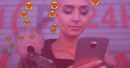 Image of media icons over caucasian woman using smartphone. social media and communication interface...