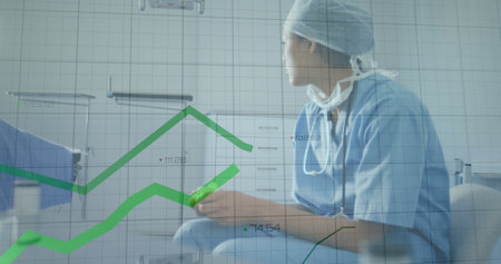 Image of data processing over sad biracial female doctor. global medicine and digital interface concept digitally generated image.の写真素材