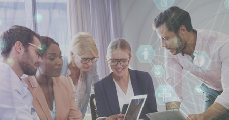 Image of statistics and data processing over business people using meeting. Global business digital interface technology and networking concept digitally generated image.の写真素材
