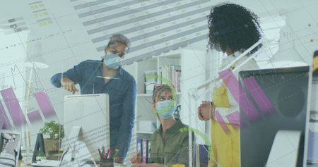 Image of financial data processing over diverse business people in face masks in office. Global...