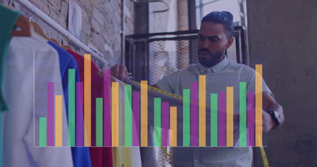 Image of data processing over biracial male designer. Global business, finances and digital interface concept digitally generated image.の写真素材