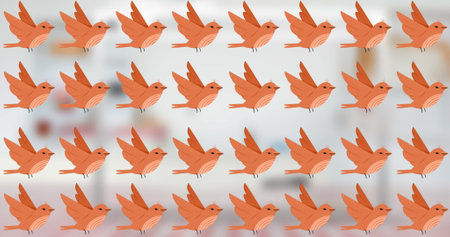Multiple orange birds with wings spread are repeating across background. Each bird is identical,...