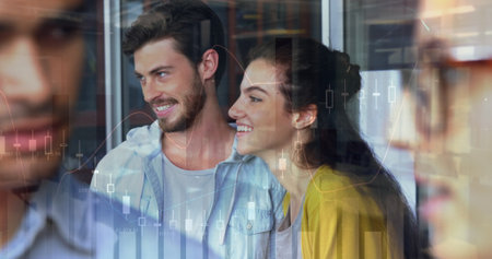 Image of financial data processing over diverse business people in office. global business, data processing and digital interface concept digitally generated image.の写真素材