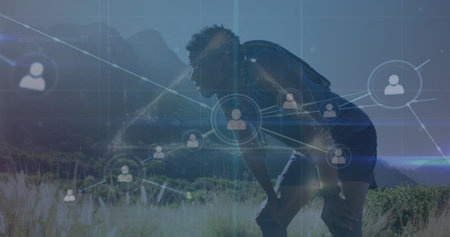 Image of network of connections over african american male hiker. Global sport and digital interface concept digitally generated image.の写真素材