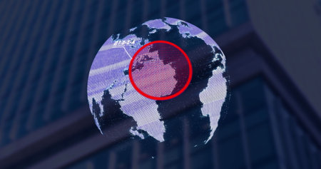 Image of globe spinning over cityscape. Global business and digital interface concept digitally generated image.の写真素材