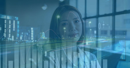 Image of diagrams and city over asian businesswoman smiling. Global business and digital interface...