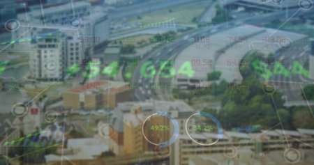 Image of financial data processing over cityscape. Global business, connections, computing and data processing concept digitally generated image.の写真素材