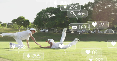 Image of icons and data processing over diverse male cricket players. Global sports, social media, connections, computing and data processing concept digitally generated image.の写真素材