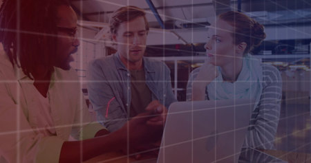 Image of data processing and diagrams over diverse business people discussing work. Business, technology and digital interface concept digitally generated image.の写真素材