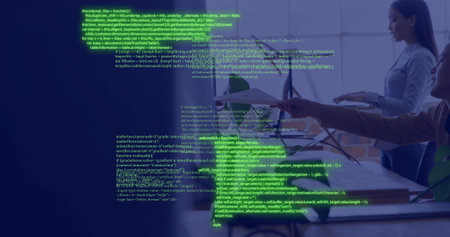 Computer code image over business person working on laptop. Technology, coding, data, corporate,...