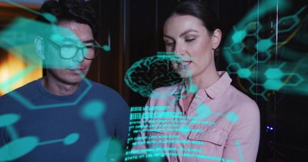 Image of data processing with brains over diverse colleagues using tablet in server room. Global science, technology, computing and digital interface concept digitally generated image.の写真素材