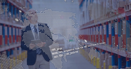 Image of digital data processing over caucasian man working in warehouse. Global shipping, connections, computing and data processing concept digitally generated image.の写真素材