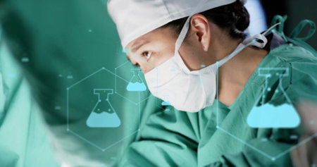 Image of dna strand over diverse surgeons in hospital. Global medicine, healthcare, connections, computing and data processing concept digitally generated image.の写真素材