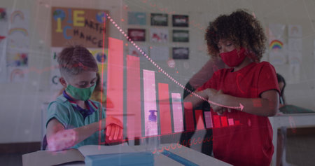 Image of statistics with teacher and schoolboy in classroom wearing face masks. Healthcare and protection during coronavirus covid 19 pandemic, digitally generated imageの写真素材