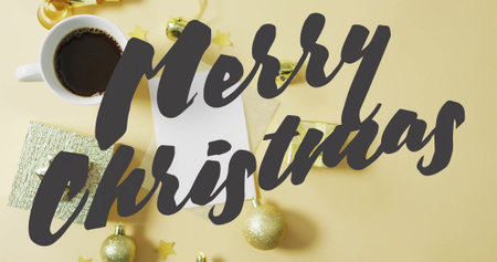 Image of merry christmas text over christmas decorations. Christmas, festivity, celebration and...
