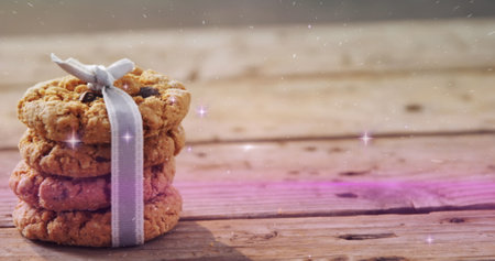 Image of coronavirus cells over woman in classroom. Christmas winter tradition and celebration concept digitally generated image.の写真素材