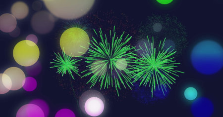 Image of colourful spots of light over green fireworks exploding in night sky. New year, party,...