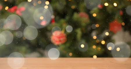 Image of falling snowflakes and white circles over christmas tree. Christmas, tradition, winter and celebration concept digitally generated image.の写真素材