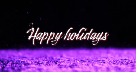 Image of happy holiday text over purple snow moving in brisk wind against black background. Digital composite, multiple exposure, greeting, winter, christmas, blowing and celebration concept.の写真素材
