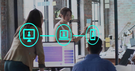 Image of digital icons and data processing over diverse business people in office. Global finance,...