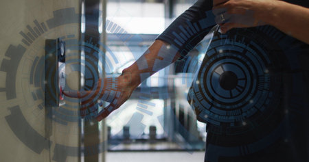 Pressing elevator button, person interacting with futuristic digital interface image. Technology,...