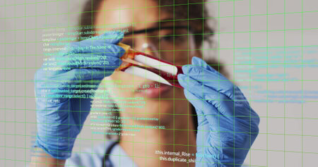 Analyzing blood sample, scientist with blue gloves over programming code image. Laboratory, bioscience, biotechnology, research, technology, analysisの写真素材