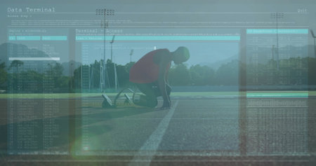 Data terminal access image over athlete preparing to start on running track. Technology, fitness, athletics, competition, training, preparationの写真素材