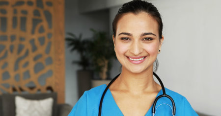 Portrait of female doctor holding a clipboard in hospital