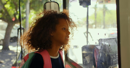 Happy girl travelling in bus