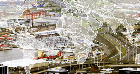 World map image over busy industrial port and highway. Globalization, international trade,...