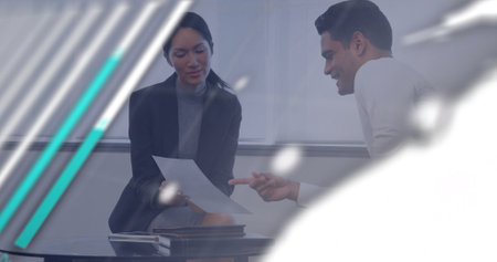 Image of financial data processing over diverse colleagues discussing work in office. Global business, finances, computing and digital interface concept digitally generated image.の写真素材