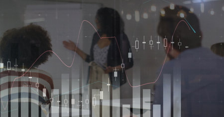 Image of data processing and diagrams over diverse colleagues talking in office. Business, technology and digital interface concept digitally generated image.の写真素材