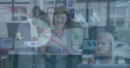 Image of financial data processing over diverse business people in office. Global finance, business, connections, computing and data processing concept digitally generated image.の写真素材