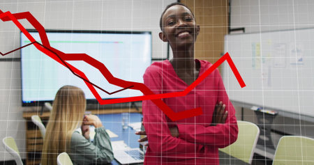 Image of diagrams over diverse female colleagues smiling and working in office. Technology, business...