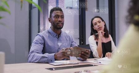 Image of data processing over diverse business people talking in office. Global social media,...