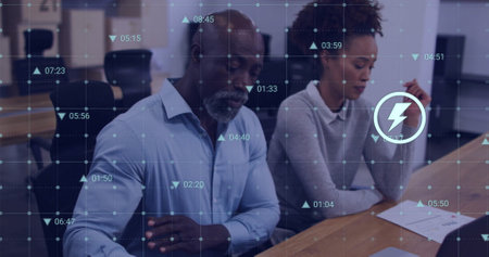 Image of financial data processing over diverse business people in office. Global finance, business,...