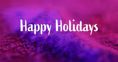 Image of happy holidays text over pink rocks falling. Technology, christmas and digital interface concept digitally generated image.の写真素材
