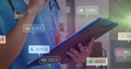 Holding clipboard, medical professional with social media notifications image. Healthcare, technology, digital, business, online, alertsの写真素材