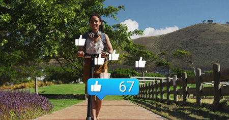 Riding scooter in park, woman over social media likes image. ride, leisure, digital, outdoor, fun,...