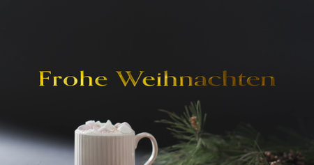 Frohe weihnacthen text in gold over christmas hot chocolate and cookies. Christmas, german, tradition, greetings and celebration digitally generated image.の写真素材
