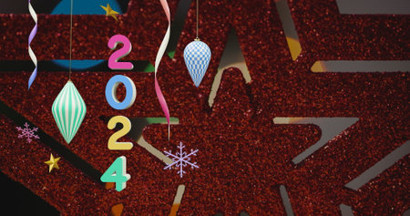 Image of 2024 text and christmas decorations in background. New year, christmas, festivity, celebration and tradition concept digitally generated image.の写真素材