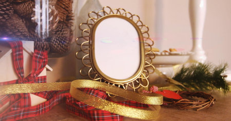 Image of glowing lights moving over christmas decorations. christmas, tradition and celebration concept digitally generated image.の写真素材