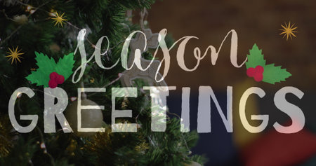 Image of christmas greetings text over christmas tree with decorations. Christmas, festivity, celebration and tradition concept digitally generated image.の写真素材