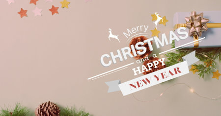 Image of christmas greetings text over christmas presents and decorations. Christmas, festivity,...