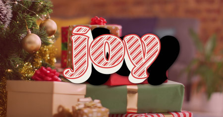 Image of christmas greetings text over christmas presents and decorations. Christmas, festivity, celebration and tradition concept digitally generated image.の写真素材