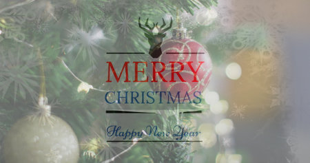 Image of christmas greetings text over christmas tree and decorations. Christmas, festivity, celebration and tradition concept digitally generated image.の写真素材